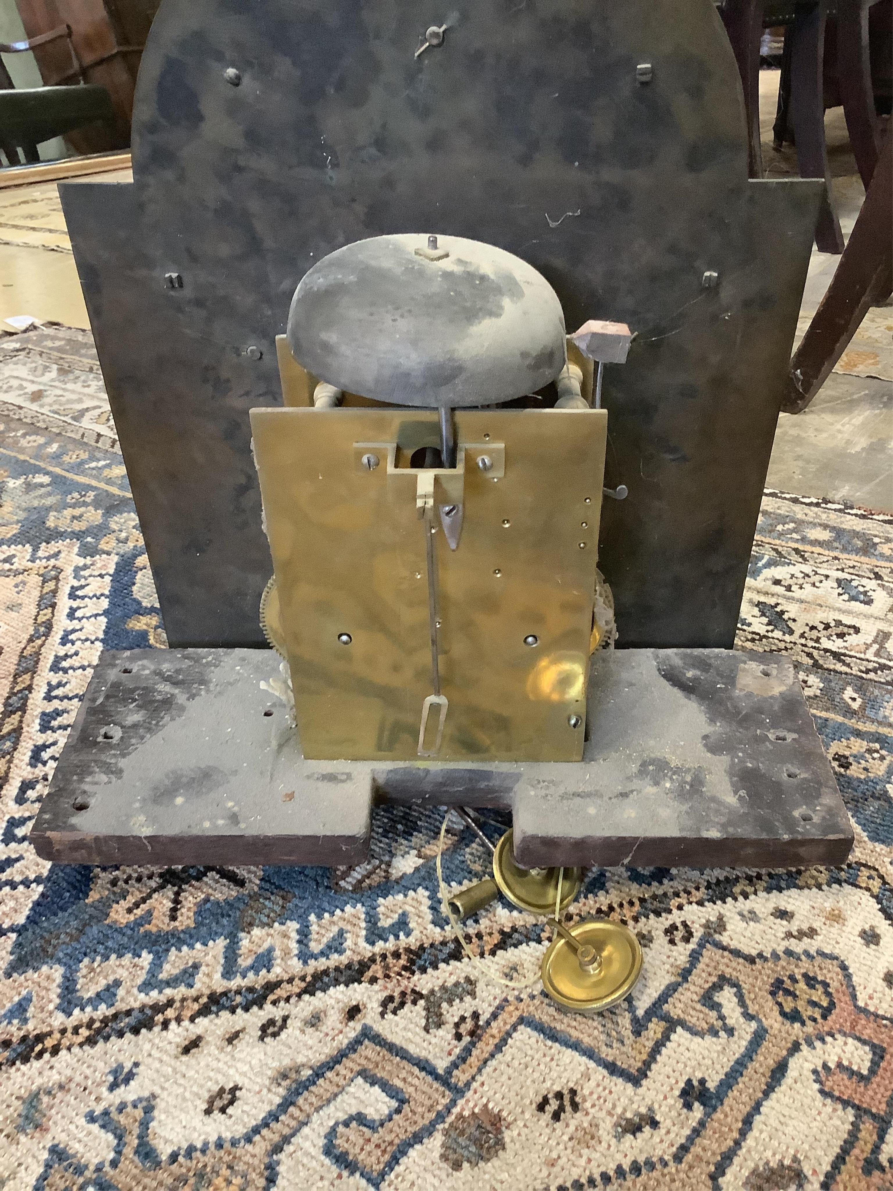 Edward Faulkner, London, a George III burr walnut cased eight day longcase clock, with an arched brass and silvered dial, height 213cm, Plinth reduced. Condition - poor
